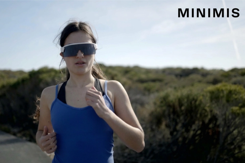 Athlete wearing Minimis Flow AR standalone sports smart glasses